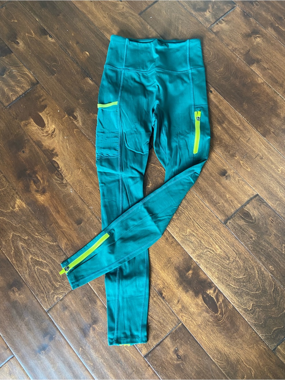 Fabletics Deep Green Motion365 Leggings with Neon Yellow Accent